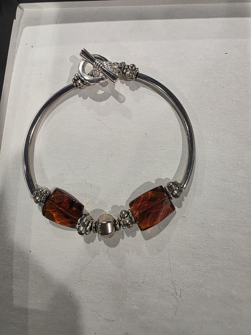 Silver-Tone Bangle Bracelet with Amber Beads
